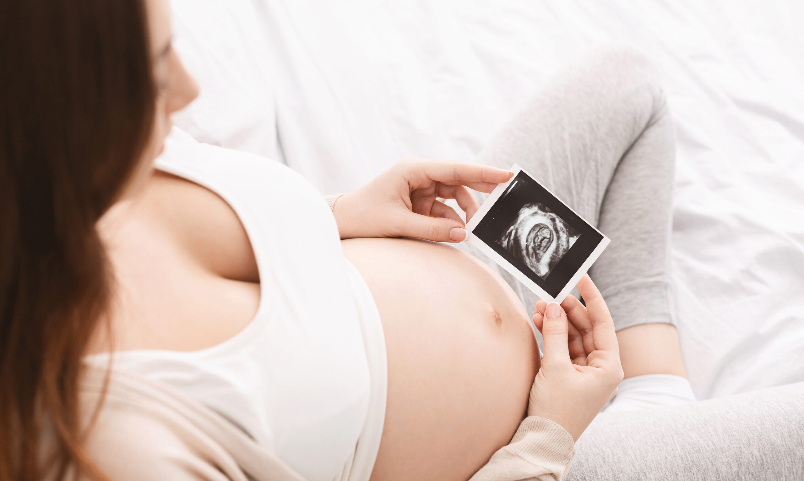 pregnant woman enjoying her baby ultrasound image 2022 12 16 07 33 40 utc scaled