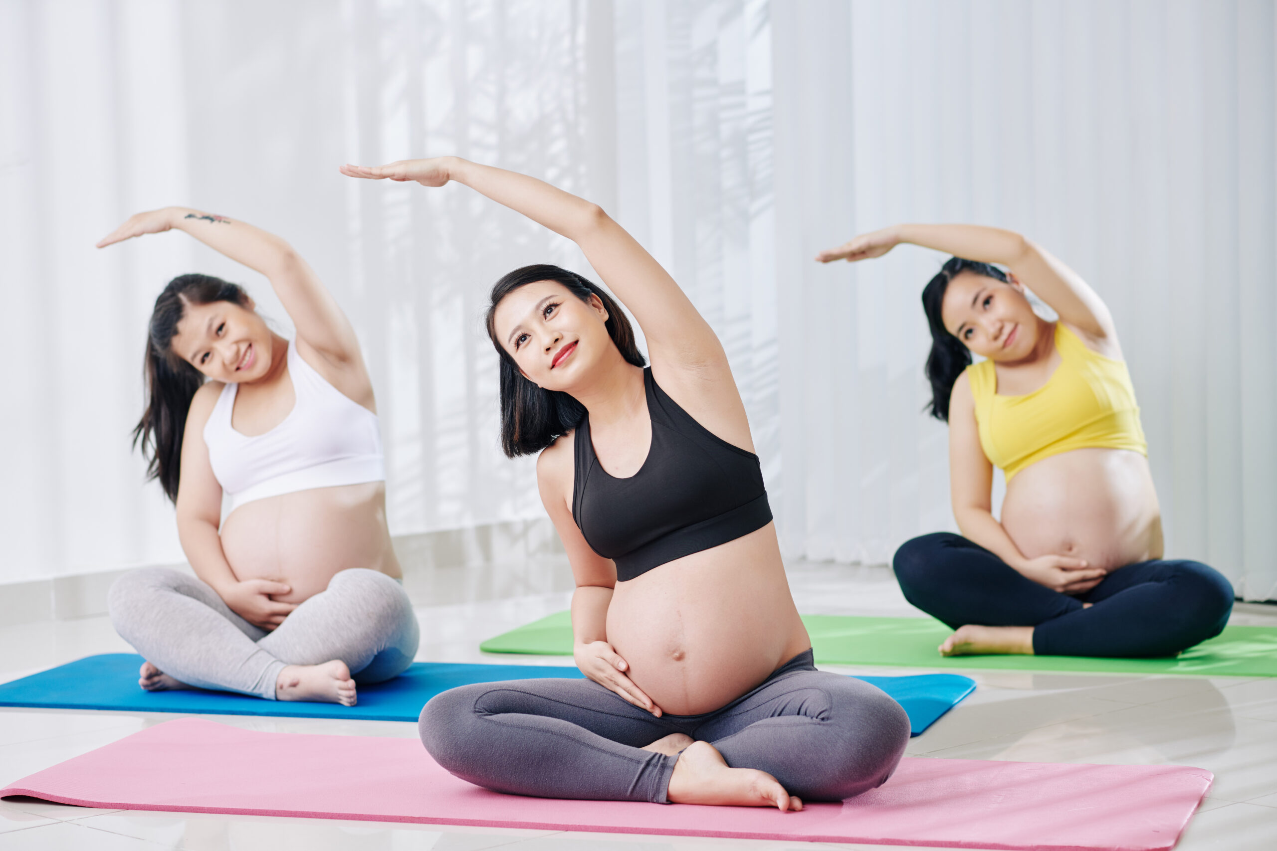 pregnant women doing side bends 2021 08 29 18 04 05 utc scaled