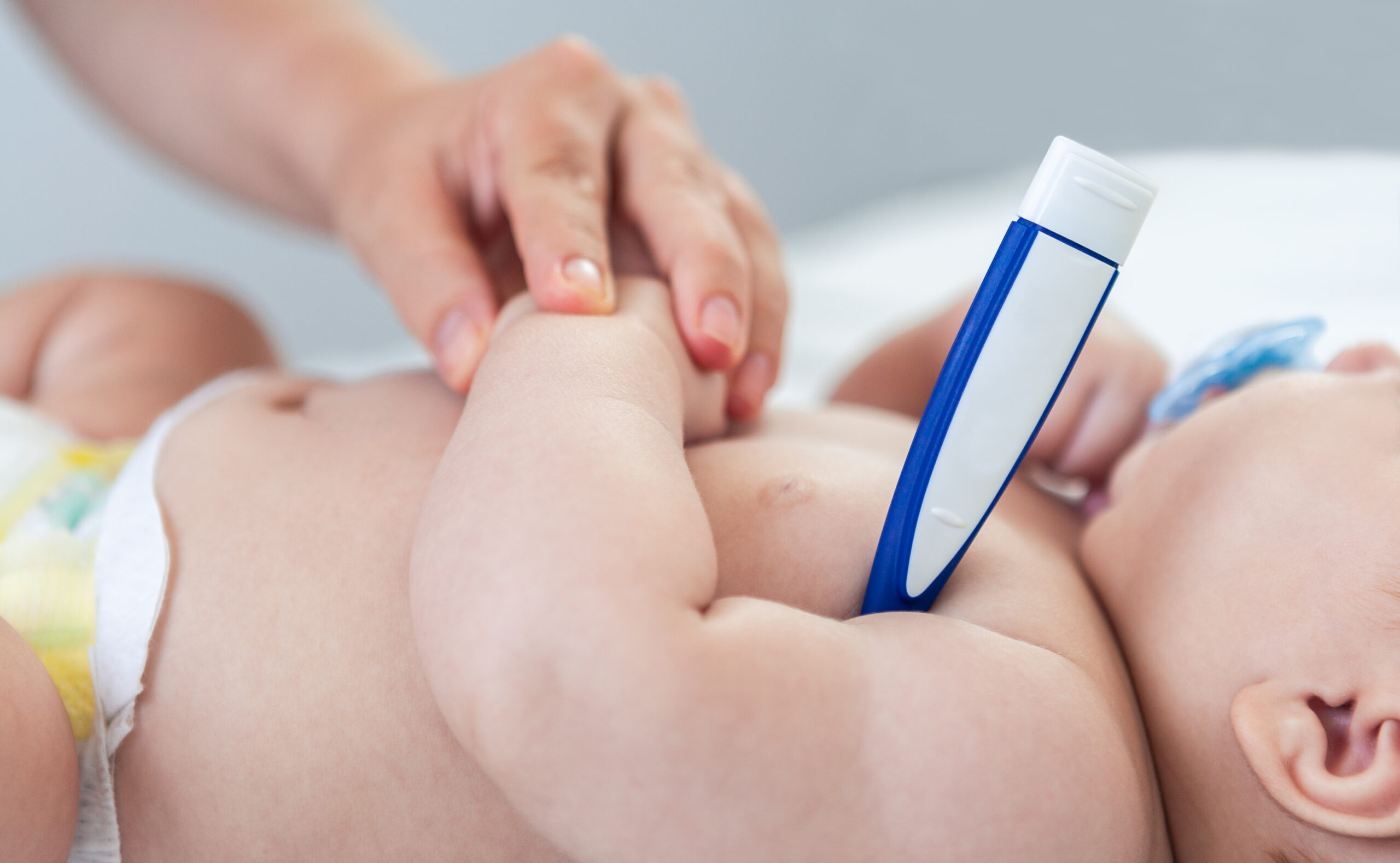 female doctor examining baby boy toddler using a t 2022 09 29 17 04 07 utc scaled