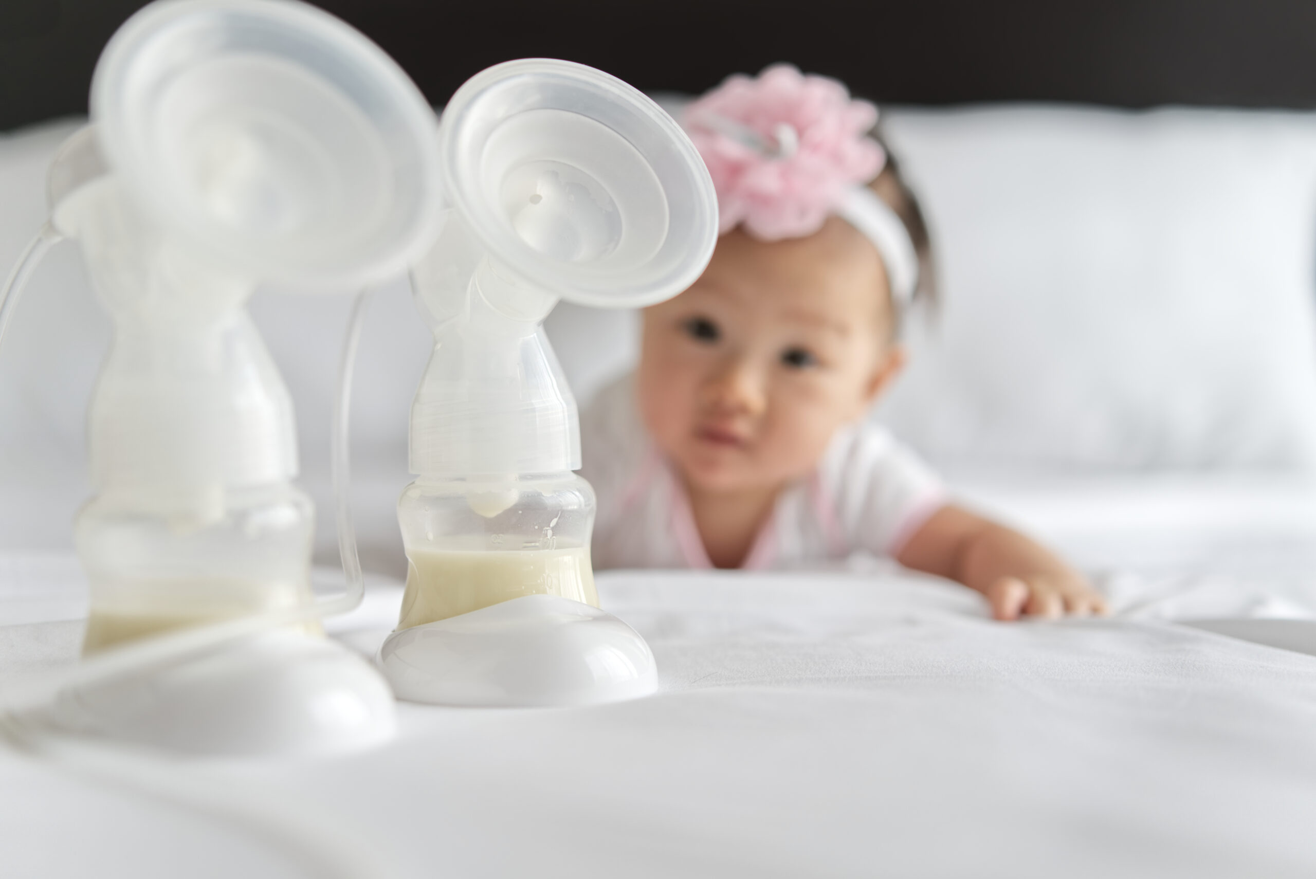 breast milk in milk pump s bottles on the bed with 2022 01 30 07 33 49 utc scaled