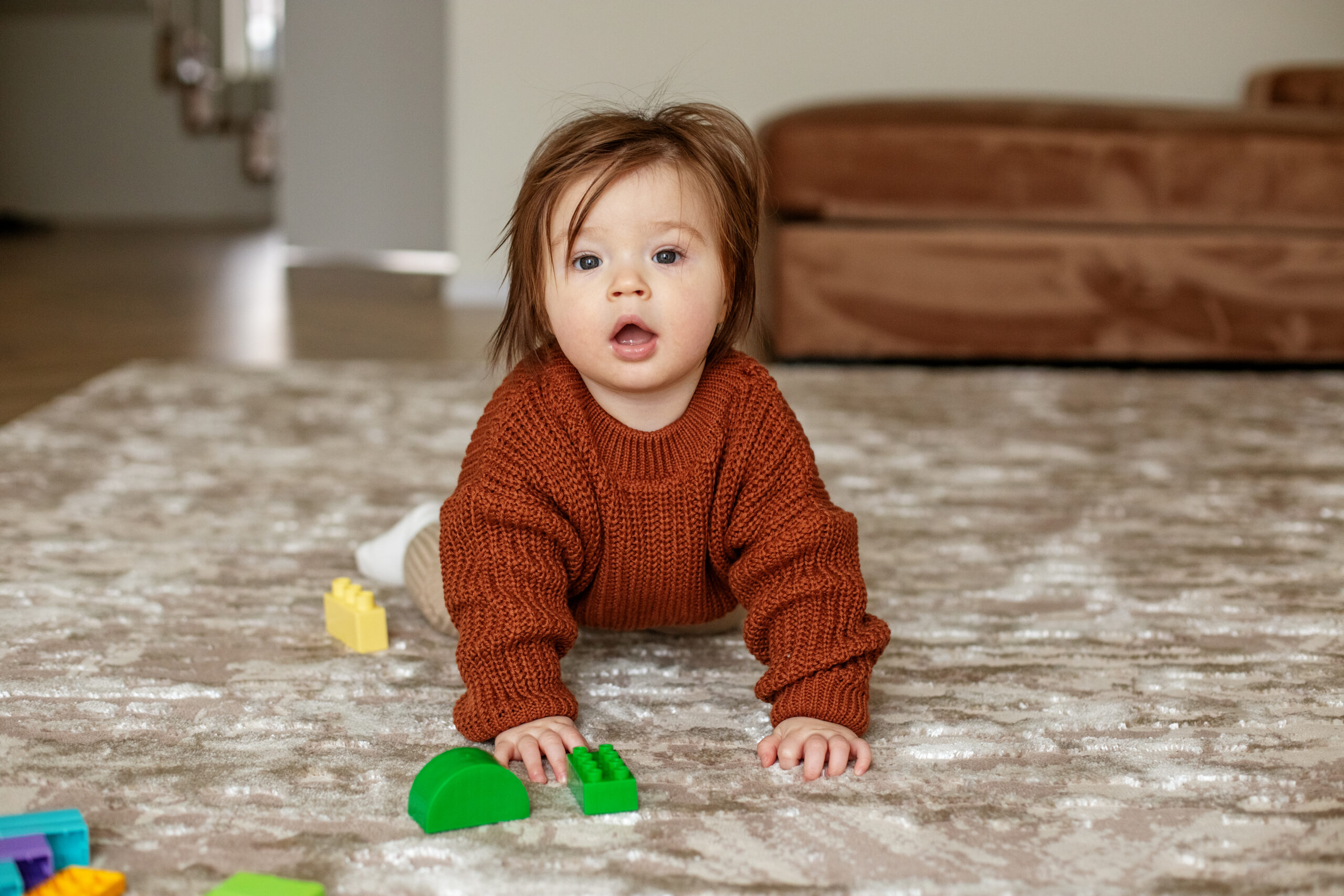 cute baby girl crawling on floor at home playing 2022 04 05 00 27 40 utc scaled